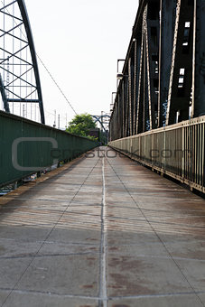 Empty railroad tracks on scale bridge