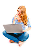 woman with laptop sitting on a white background