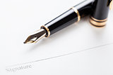 macro closeup sign document contract pen filler 
