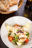 tasty fresh caesar salad with grilled chicken and parmesan 