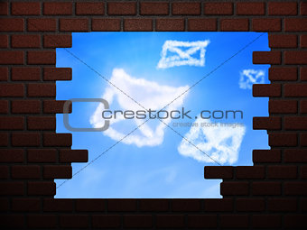 Cloud envelopes in hole in brick wall