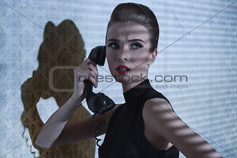 girl with vintage telephone 