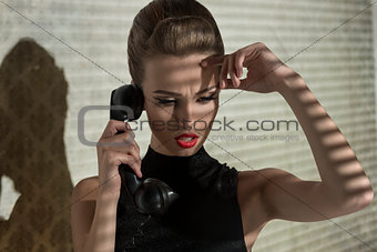 worried girl talking on phone 