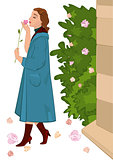 Retro girl with flower near rose bush
