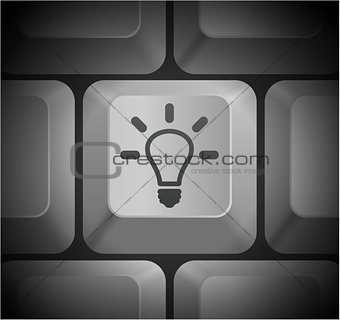 Light Bulb Icon on Computer Keyboard