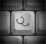 Stethoscope Icon on Computer Keyboard