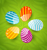 Easter set colorful ornamental eggs on green leaves background