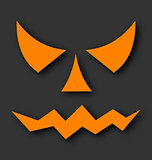 Jack o lantern pumpkin faces glowing on black background