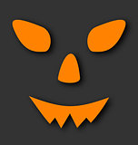 Jack o lantern pumpkin faces glowing on black background