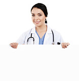 Female doctor holding blank sign