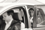 groom sitting in a car