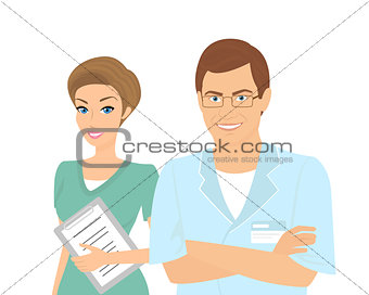 Smiling female and male dentists isolated on white