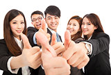happy successful business team with thumbs up