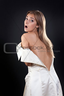pretty girl with bare back in the studio