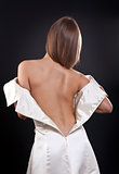 pretty girl with bare back in the studio