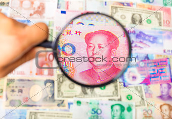 using a magnifier to search the method of Asian Market