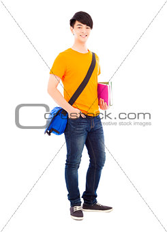 confident student holding books and slanting knapsack