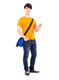 young student holding books and slanting knapsack