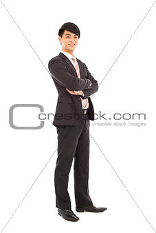 confident  businessman standing and across arms