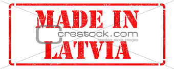 Made in Latvia on Red Rubber Stamp.