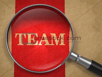 Team - Magnifying Glass on Old Paper..