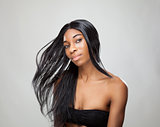 Black woman with long straight hair