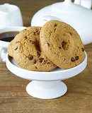 delicious homemade cookies with chocolate chips on a wooden table