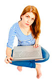 a charming young girl on a white background with a laptop