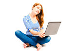 barefoot beautiful woman sitting with a laptop