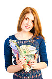 A young woman holds a bunch of money