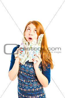 Surprised girl thinks to spend money