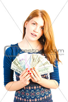 portrait of a beautiful woman with money in studio