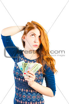 beautiful woman posing on a white background with money