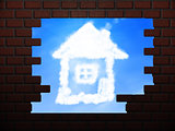 House of clouds in hole in brick wall