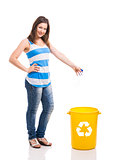 Beautiful young woman recycling