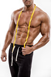 Muscle man with measuring tape