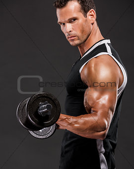 Muscle man lifting weights