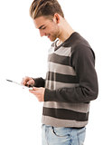 Young man working with a tablet