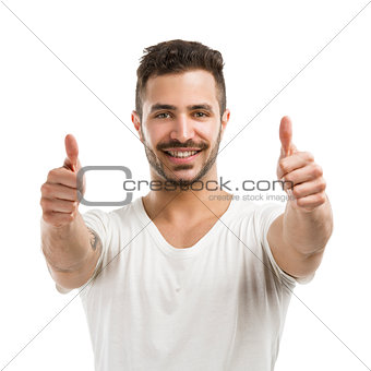 Man smiling with thumbs up
