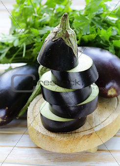 fresh ripe vegetables purple eggplant  on a wooden table