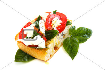 Ciabatta with tomato and cheese.