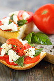 Ciabatta with tomatoes, cheese and basil.