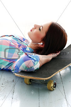 Beautiful girl with skateboard