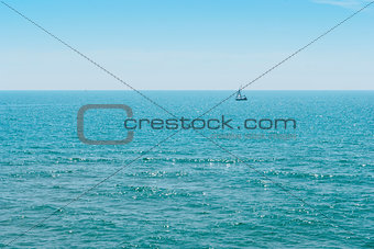 Yacht and blue water ocean