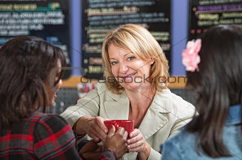Woman Giving Coffee