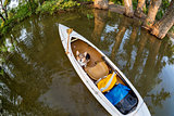 Corgi dog in canoe