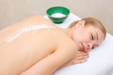 Woman resting with salt crystals back