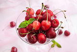 Fresh wet cherry in a glass