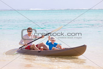 family at kayak