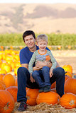 family at pumpkin patch
